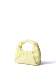 Bright yellow Marshmallow Croissant leather handbag by Brix Bailey at www.brixbailey.com