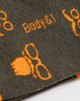 Novelty party socks with glasses and mustache, premium cotton-rich, ultra-snug, trending holiday statement socks, grey-orange cherry-cyan by Body and I at brixbailey.com