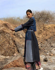 Luxury upcycled denim trench coat, patchwork multicolor, handcrafted premium cotton, stylish notch collar, tie-up belt, made in India by Bethikal at brixbailey.com
