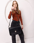 Black Leather Handbag with Buckle Closure