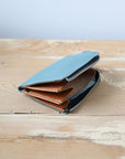 Compact WEDNESDAY Leather Wallet – Spacious & Stylish by TOKS VISOKS at www.brixbailey.com