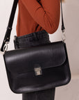 Black Leather Handbag with Buckle Closure