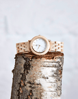 Luxury upcycled maple wood watch for women, handcrafted from recycled furniture, white dial with gold accents and natural wood by The Sustainable Watch Company at brixbailey.com
