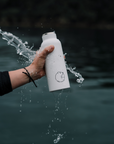 Premium Arctic Bottle, double-wall vacuum-insulated stainless steel water bottle, eco-friendly bamboo lid, keeps drinks hot or cold, BPA-free, leak-proof, biodegradable packaging by Arcticus at brixbailey.com