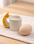 Cat Egg Cup (ORANGE) – A Playful Ceramic Breakfast Object | 4am Product Design
