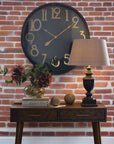 Retro-modern brass numeral wall clock with black face, 80cm diameter, vintage-inspired statement piece for home decor by sostter at brixbailey.com