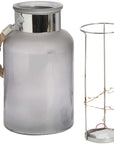 Frosted grey glass lantern with rope handle and LED lights, glowing starlight effect for indoor or outdoor ambiance. by RoomLondon at brixbailey.com