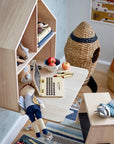 Premium rocket-shaped seagrass storage basket with lid, stylish black and white handpainted design, natural toy and laundry organizer by Ella James at brixbailey.com