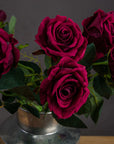 Lifelike deep crimson artificial rose with velvety petals and natural stems, inspired by Rosa 'Black Baccara'. by Sostter at brixbailey.com