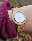 Upcycled maple wood watch for women, handcrafted recycled wood, white dial, gold accents, light natural wood, stylish premium accessory by The Sustainable Watch Company at brixbailey.com