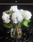 Real touch white hydrangea arrangement in glass vase - 8"