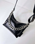Black Leather Handbag with Metallic Straps
