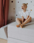 Versatile Montessori Play Sofa – Safe & Creative Fun for Kids by Monboxy at www.brixbailey.com