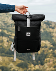 Premium Polar Explorer Backpack in black, waterproof hemp backpack with laptop compartment, USB charging, ergonomic support, supports polar bear conservation by Arcticus at brixbailey.com