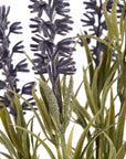 Realistic faux lavender stems with purple blooms and green accents, perfect for year-round home decor by sostter at brixbailey.com