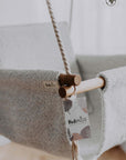 Bouclé Cloth Baby Swing – Eco-Friendly & Child-Safe Comfort by Nofi KIDS at www.brixbailey.com