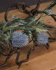 Artificial blue thistle stem with lifelike powder-blue petals and cone, 76cm tall, perfect for rustic or coastal decor by sostter at brixbailey.com