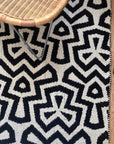 Luxury monochrome flat weave wool rug, handmade in India, stylish geometric design with tassels, best-selling neutral tone decor by Maria Starling Design at brixbailey.com
