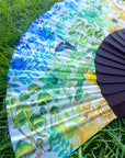 Colourful Silk folding hand fan 'kaleido-bloom' print with floral & nature filled rainbow design