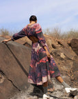 Luxury printed gathered dress with elasticated back, side pockets, upcycled cotton, purple, fair wage handmade in India by Bethikal at brixbailey.com