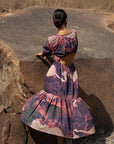 Luxury printed gathered dress with elasticated back, side pockets, upcycled cotton, purple, fair wage made in India by Bethikal at brixbailey.com