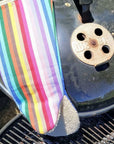 Premium rainbow striped oven glove, long gauntlet style, heat-resistant, handcrafted in UK, sustainable recycled organic fabric, stylish kitchen essential by Maison Elhoria at brixbailey.com