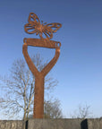 Rusty Metal Butterfly On A Spade Garden Decoration