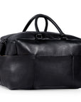 Premium black leather weekender bag, handmade sustainable travel bag with full grain cowhide, antique brass hardware, spacious compartments, detachable laptop sleeve by Bethikal at brixbailey.com