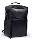 Premium black leather backpack for adventure and travel, handcrafted from recycled full-grain cowhide with antique brass hardware, spacious laptop compartment, and eco-friendly design. by Bethikal at brixbailey.com