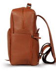 Premium tan leather backpack, sustainable recycled materials, handcrafted full grain cowhide, spacious laptop sleeve, durable antique brass hardware, stylish travel companion by Bethikal at brixbailey.com