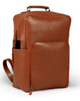Premium tan leather backpack, sustainable recycled materials, handcrafted full-grain Nappa leather, antique brass hardware, spacious laptop compartment, durable travel bag by Bethikal at brixbailey.com