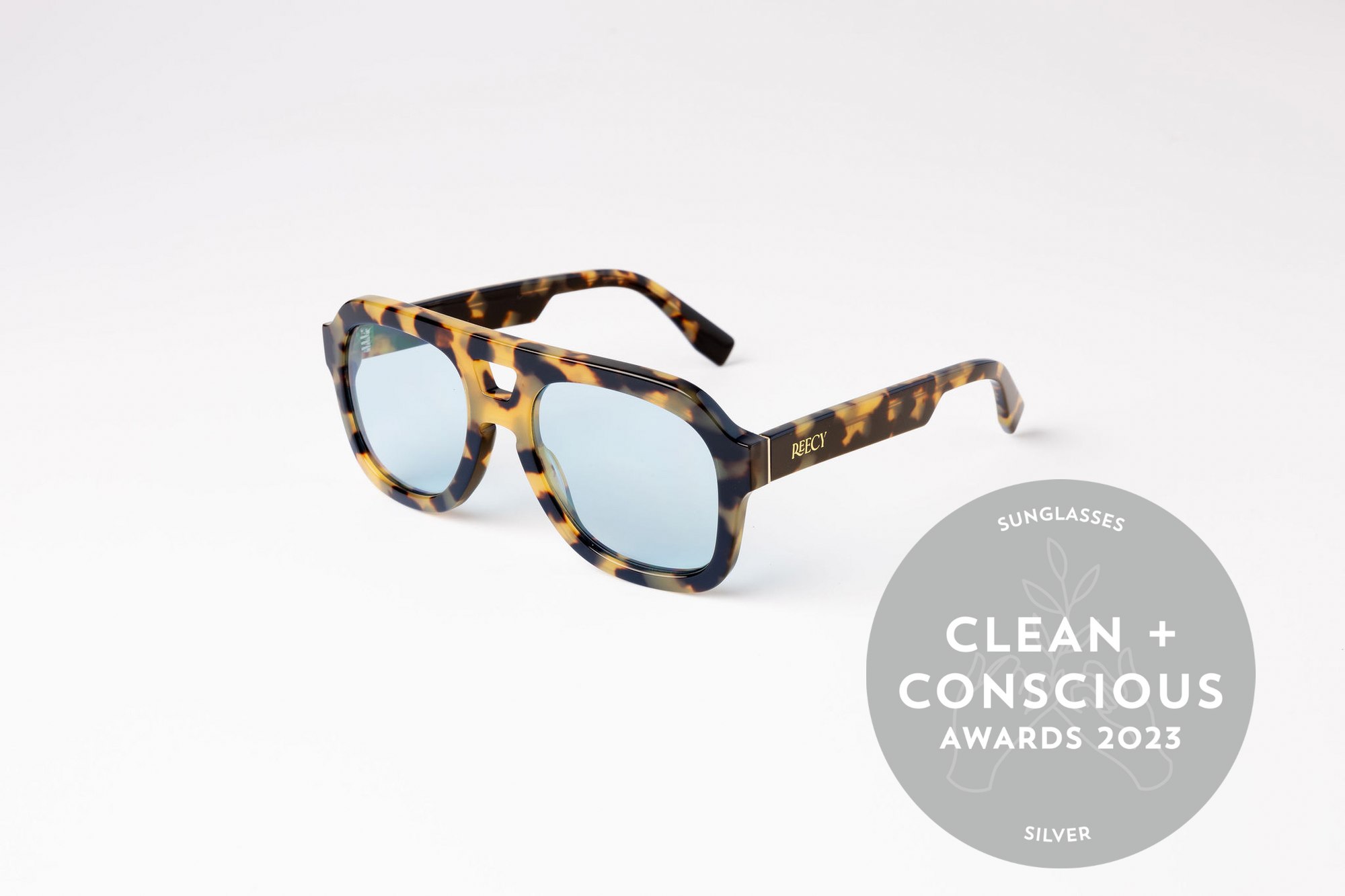 A Reecy Family Favorite: Sustainable Tortoiseshell Aviator Sunglasses with Blue Lenses – Clean & Conscious Award Finalist 2023 by Reecy at brixbailey.com