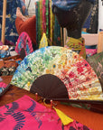 Colourful Silk folding hand fan 'kaleido-bloom' print with floral & nature filled rainbow design