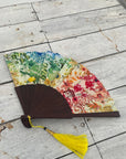 Colourful Silk folding hand fan 'kaleido-bloom' print with floral & nature filled rainbow design