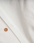 Luxury 100% organic cotton percale duvet cover, premium white handcrafted duvet, soft breathable percale weave, best-selling king or double size by Karpāsa London at brixbailey.com