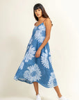 Luxury handcrafted batik floral dress, blue and white upcycled cotton, adjustable straps, side pockets, artisan-made in India by Bethikal at brixbailey.com