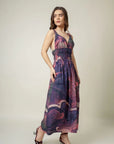 Purple printed dress by August with waist ruching, side pockets, and upcycled cotton at www.brixbailey.com