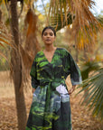 Premium oversized green printed dress, sustainable upcycled cotton, drawstring waist, side pockets, long length, ethically made in India, limited edition by Bethikal at brixbailey.com