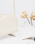 Crescent-Shaped Leather Mini Moon Bag – Chic & Versatile by Craftory at brixbailey.com