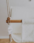 Eco-Friendly Recycled Bouclé Baby Swing – Safe & Stylish by Nofi KIDS at www.brixbailey.com