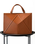 Handcrafted Leather Laptop Case by Gerda Retter – Durable & Stylish by Gerda Retter Design at www.brixbailey.com