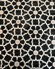 Luxury black cement floor tile with elegant white floral pattern, premium hexagon kitchen and bathroom tiles, best-selling UK delivery by Maria Starling Design at brixbailey.com