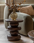 Luxury sculptural mango wood side table, retro dark wood finish, stylish home decor by Ella James at brixbailey.com