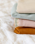 Premium faemli Baby Lounger Cover, 100% soft cozy cotton, 4 stylish colors, machine washable, snug fit for baby lounger by Faemli at brixbailey.com