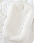 premium baby lounger, portable infant nest, soft organic cotton and tencel, best-selling newborn lounger for tummy time and reflux relief by Faemli at brixbailey.com