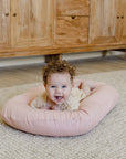 premium baby lounger, portable infant nest, soft and snug newborn lounger, best-selling tencel baby nest, stylish organic cotton baby lounger by Faemli at brixbailey.com