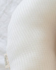 premium baby lounger, portable infant nest, soft tencel fabric, breathable 3D mesh, lightweight polyester fill, reflux relief design by Faemli at brixbailey.com