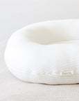 premium baby lounger, portable infant nest, soft and snug newborn lounger, best-selling tencel baby nest, stylish organic cotton baby lounger by Faemli at brixbailey.com