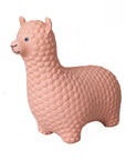 beige alpaca jumpy hopper toy for toddlers on a soft rug in warm morning light