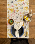 Transform Your Dining Experience with the Easter Happy Table Runner - Elegant & Durable Cotton Design by Hortensias Home at www.brixbailey.com